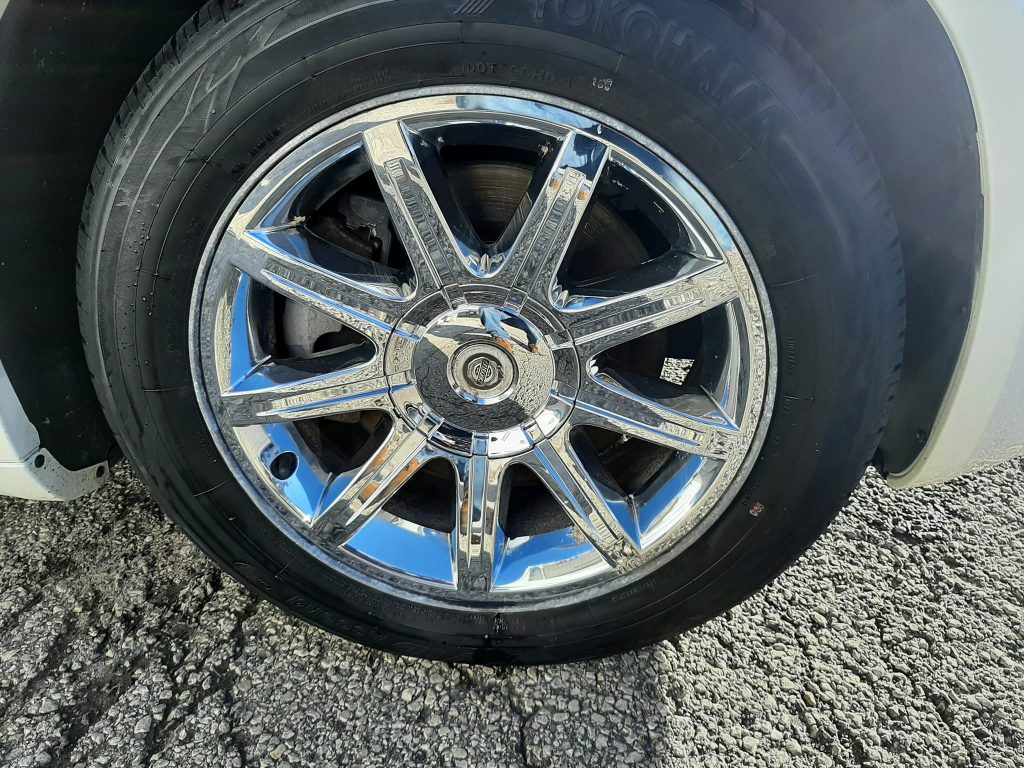 Rim on a tire after vehicle detailing services.